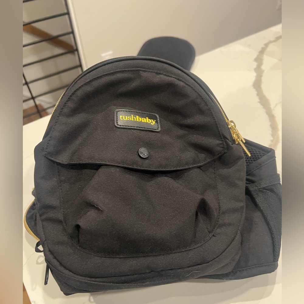 Black Tushbaby (like new)